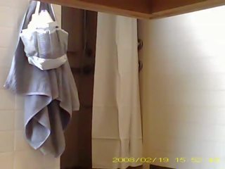 Spying flirty 19 year old lady showering in dorm bathroom